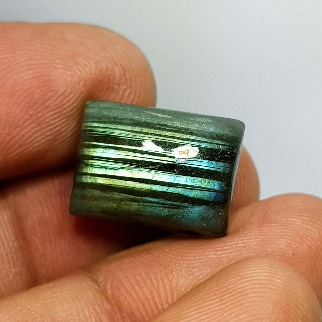 12.82 ct Natural Labradorite: No Reserve! Title: 12.82 ct Natural Labradorite Color/Clarity: Bluish Green / Semi Transparent Gemstones: Labradorite Carat Weight: 12.82 Size/Dimensions: 15.26 x 11.86 x 6.88 Additional Information:
