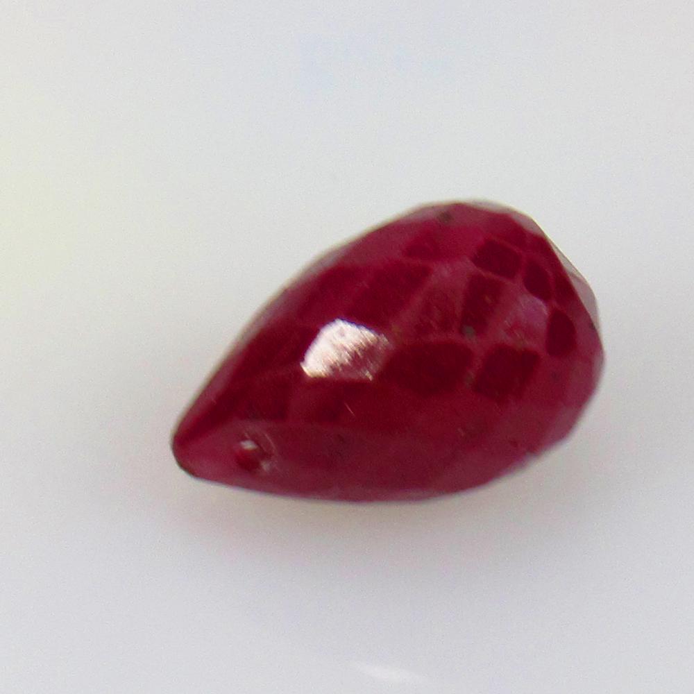 6.50 Ctw Natural Mozambique Red Ruby Pear Drop Beads: No Reserve! Title: 6.50 Ctw Natural Mozambique Red Ruby Pear Drop Beads Stone Clarity: Opaque Gemstones: Ruby Beads Carat Weights: 6.5 Size/Dimensions: 12.00 x 7.80 x 7.80 mm Additional Information: D