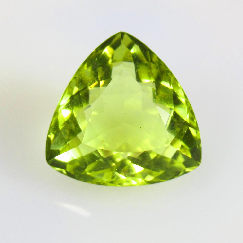 12.40 Ctw Natural Lemon Quartz Trillion Cut: No Reserve! Title: 12.40 Ctw Natural Lemon Quartz Trillion Cut Stone Clarity: VVS Gemstones: Natural Lemon Quartz Carat Weights: 12.4 Size/Dimensions: 15.40 x 15.30 x 9.40 mm Additional Information: T