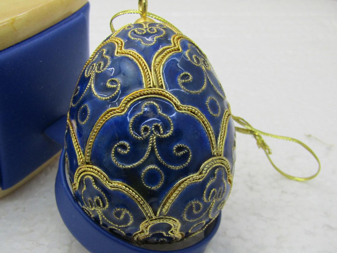Cloissonne Blue & Gold Scrolled Floral Egg, 2.5" Tall: Cloissonne Blue & Gold Scrolled Egg, 2.5" Tall, and appx. 2" across. Pretty design in blues with gold accents - sort of a fleur-de-lis but not. Vintage new stock. Very good condition. (INV.w.12X19.5 S