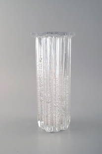 Willy Johansson for Hadeland, Norway. Ribbed "Atlantic" vase in clear art glass with bubbles.: Willy Johansson for Hadeland, Norway. Ribbed "Atlantic" vase in clear art glass with bubbles. In very good condition. Signed. Measures: 26 x 12 cm. Reserve: $175.00 Shipping:Domestic: Shipping