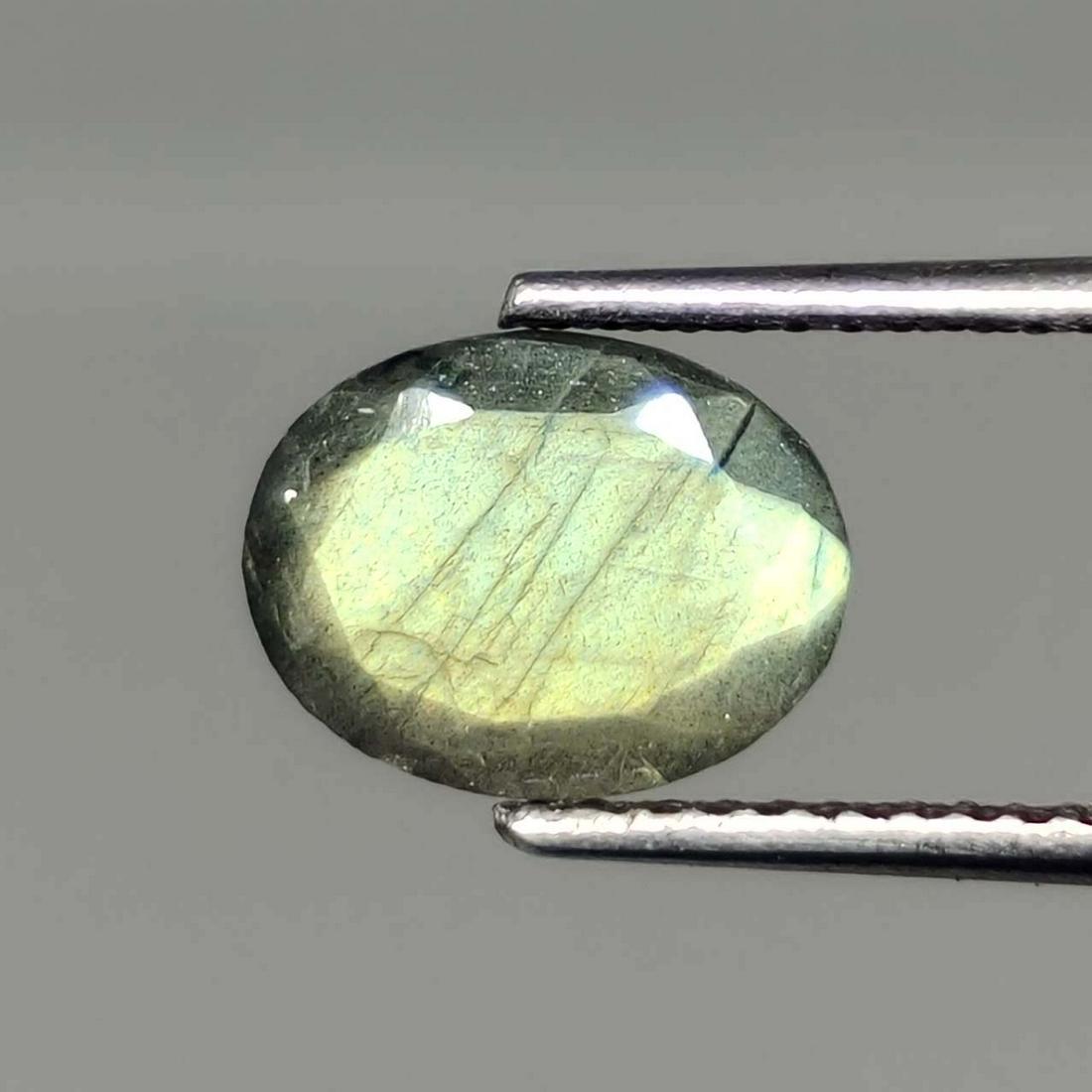 1.40 ct Natural Faceted Labradorite: No Reserve! Title: 1.40 ct Natural Faceted Labradorite Additional Information: Gemstones: Labradorite Carat Weights: 1.40 ct Size/Dimensions: 9 X 7 mm Origin : Labrador Materials & Techniques: Labrado