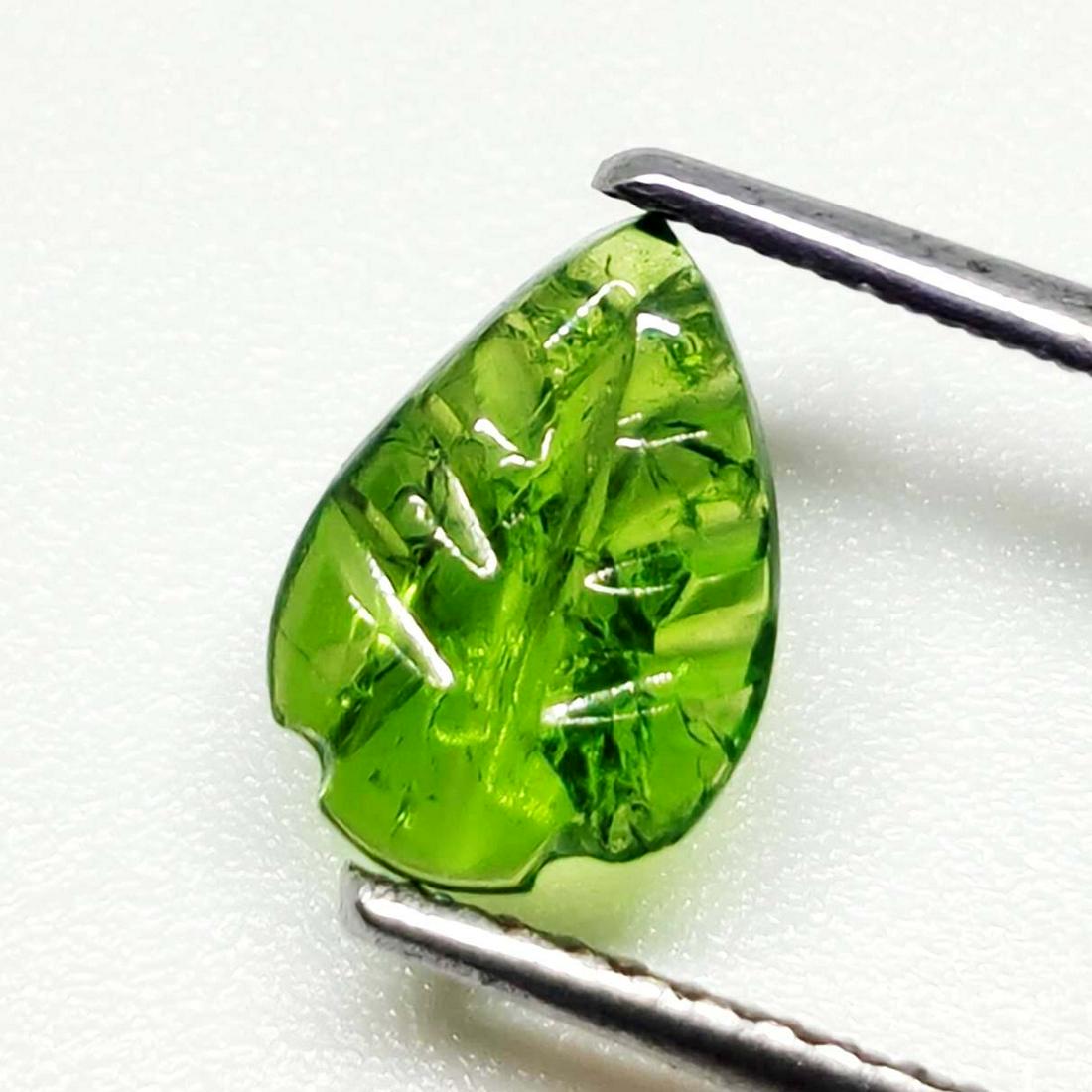 0.80 ct Natural Tourmaline Leaf: No Reserve! Title: 0.80 ct Natural Tourmaline Leaf Additional Information: Gemstones: Tourmaline Carat Weights: 0.80 ct Size/Dimensions: 8.5 X 6 mm Materials & Techniques: Tourmaline Weight Unit: Ct S