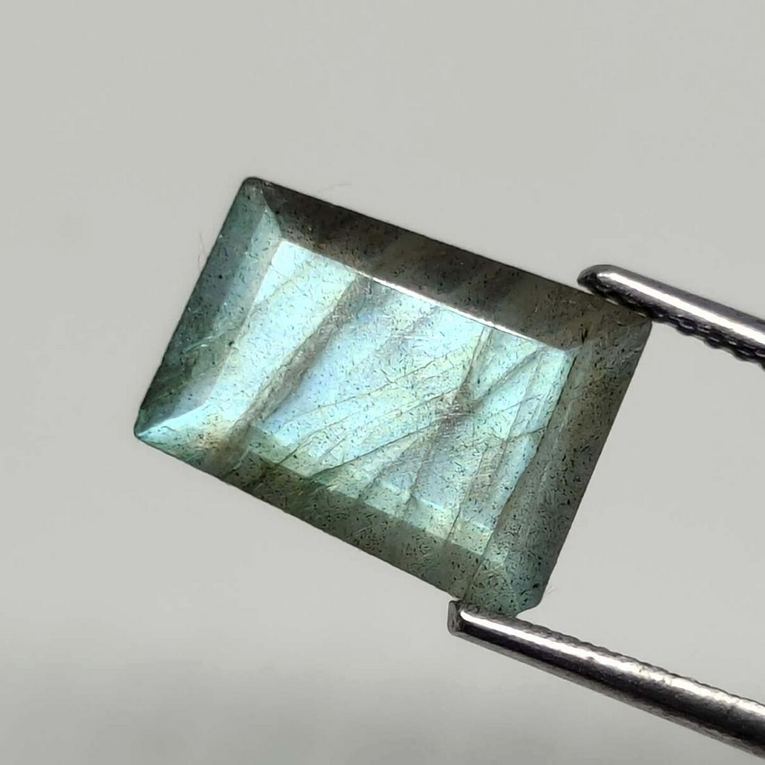 4 ct Natural Faceted Labradorite: No Reserve! Title: 4 ct Natural Faceted Labradorite Additional Information: Gemstones: Labradorite Carat Weights: 4 ct Size/Dimensions: 11 X 8.6 X 5 mm Origin : Labrador Materials & Techniques: Labrad