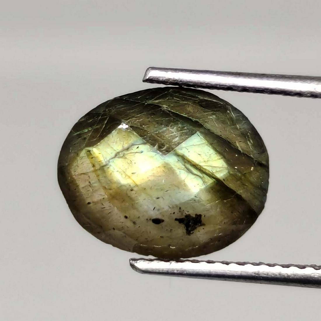 3.05 ct Natural Faceted Labradorite: No Reserve! Title: 3.05 ct Natural Faceted Labradorite Additional Information: Gemstones: Labradorite Carat Weights: 3.05 ct Size/Dimensions: 9 X 11 mm Origin : Labrador Materials & Techniques: Labrad