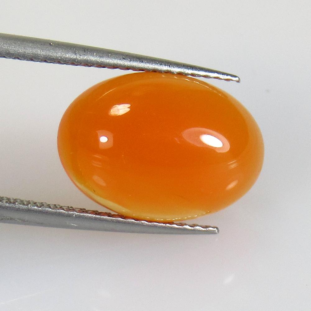 4.64 Ctw Natural Orange Carnelian Oval Cab: No Reserve! Title: 4.64 Ctw Natural Orange Carnelian Oval Cab Stone Clarity: Semi-Transparent Gemstones: Carnelian Carat Weights: 4.64 Size/Dimensions: 14.00 x 9.90 x 4.80 mm Additional Information: E