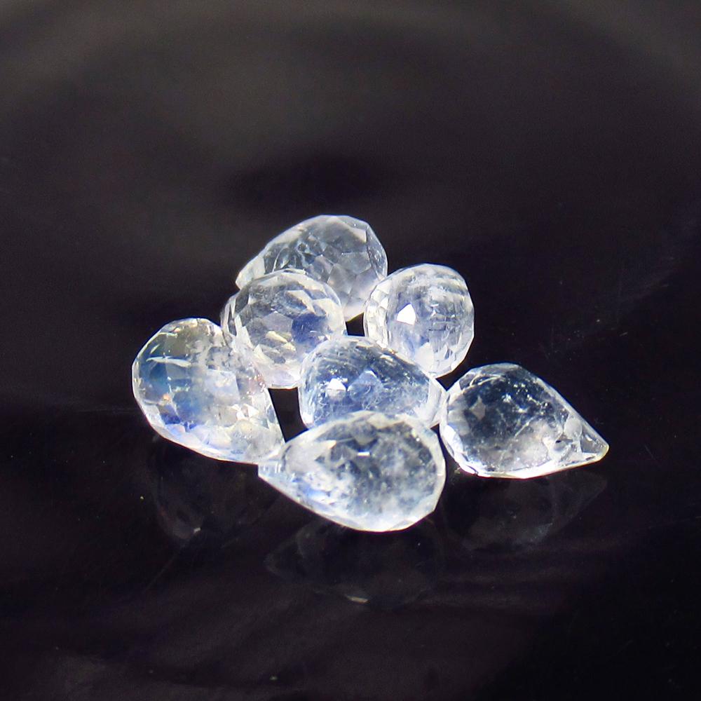 5.89 Ct Natural 7 Drilled Blue Moonstone Pear Drop Beads: No Reserve! Title: 5.89 Ct Natural 7 Drilled Blue Moonstone Pear Drop Beads Stone Clarity: Transparent Gemstones: Natural Blue Moonstone Beads Carat Weights: 5.89 Size/Dimensions: 7.0x4.4 to 7.4x4.8 m