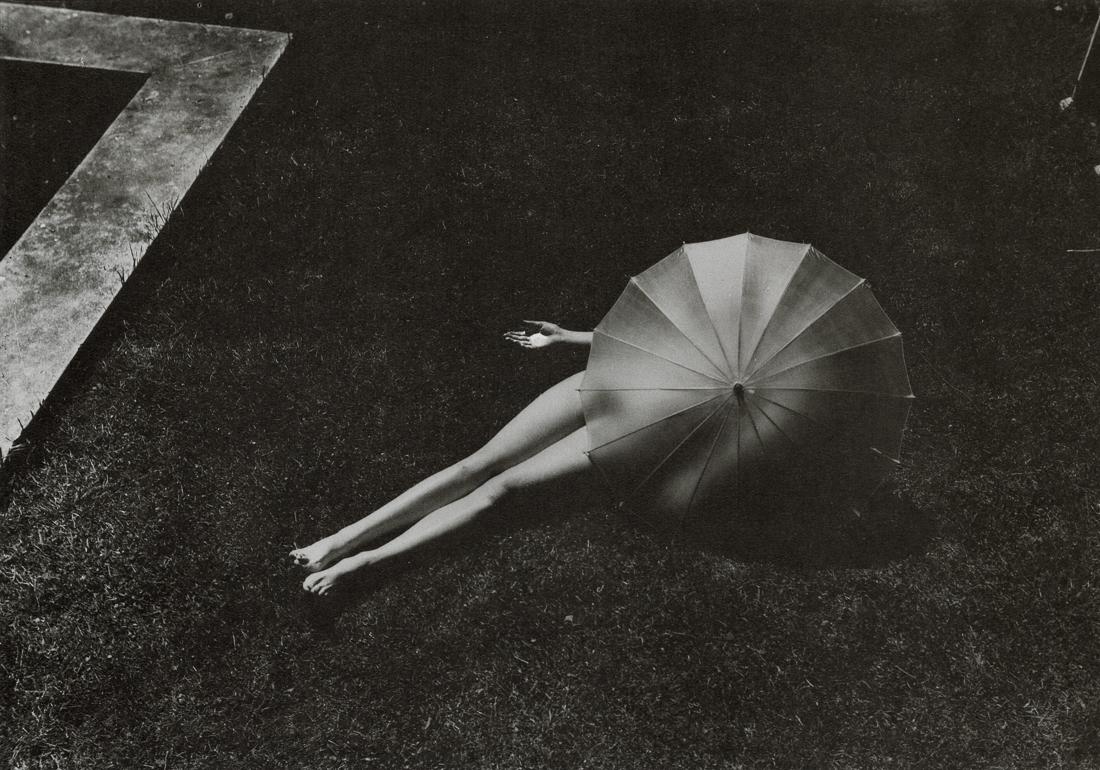 MARTIN MUNKACSI - Nude with Parasol, 1935: Artist: Martin Munkacsi Title: Nude with Parasol, 1935 Medium: Photo Litho, 1980, USA Dimensions: 8.05x5.65" Description: Heat Wax Mounted on 8.5x11" Conservation Board Artist Bio: Martin Munkacsi was