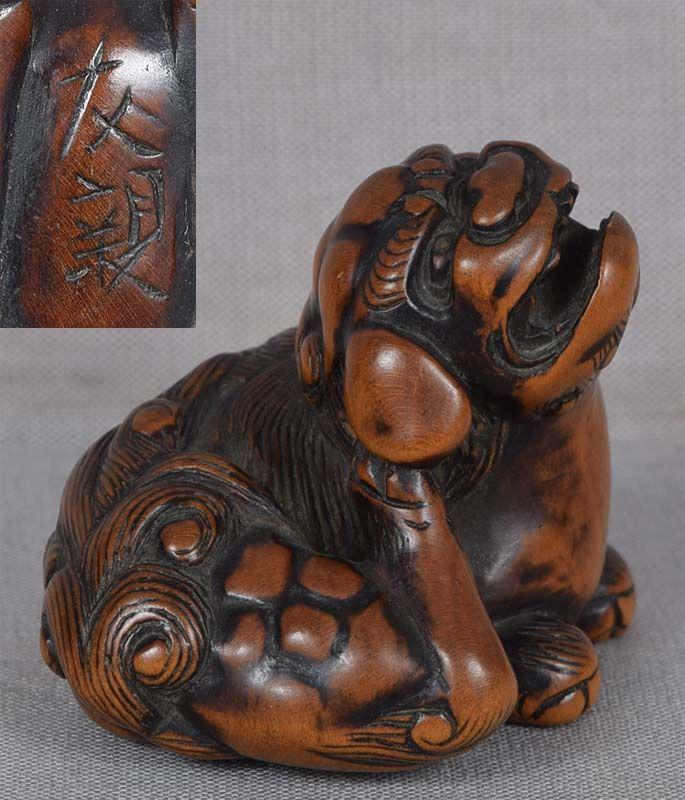 Early 19c netsuke SCRATCHING SHISHI by TOMOCHIKA the 1st (1 of 6)