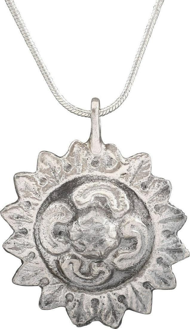 ROMAN WHEEL OF FORTUNE AMULET NECKLACE, 5TH-7TH CENTURY AD: Late Roman/Byzantine period, 5th-8th century AD. The concept of the Rota Fortunae, the Wheel of Fortune, dates back millennia with the Roman goddess Fortunae capriciously deciding the fate of men with