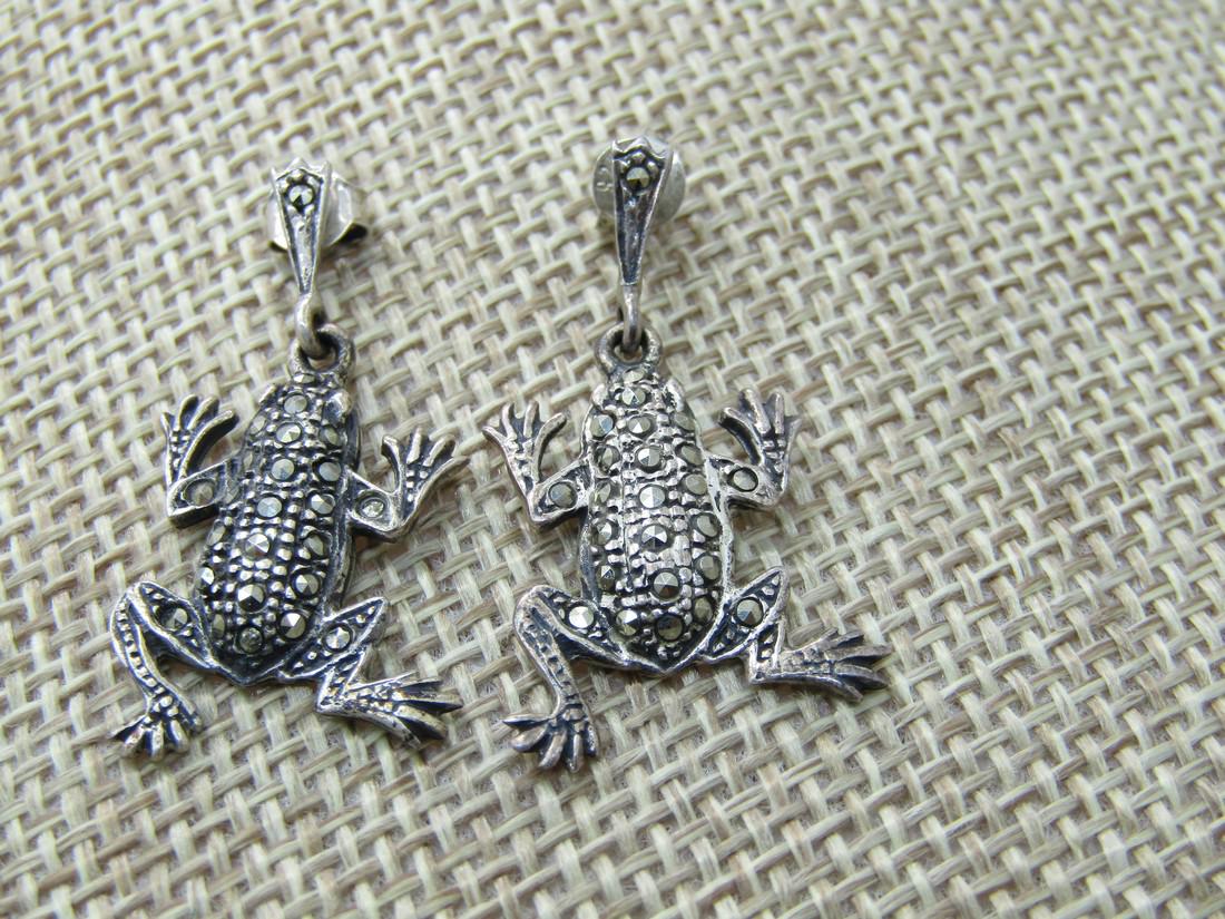Vintage Sterling Marcasite Frog Earrings, Pierced: Vintage Sterling Marcasite Frog Earrings, Pierced, 1.25" long and 5/8" wide sith a marcasite accented slender stud and a dangling frog. Marked .925 and tested. Weight is appx. 3.65 grams. It appears t