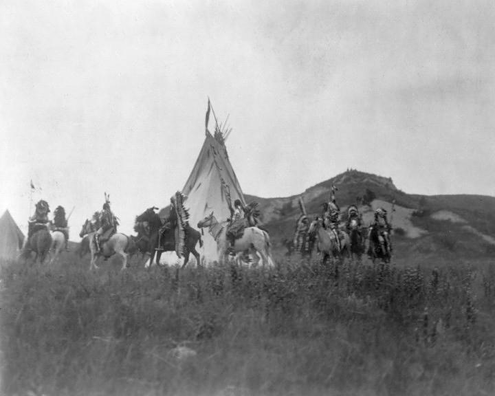 START OF DAKOTA WAR PARTY; BY EDWARD S. CURTIS: Title: START OF DAKOTA WAR PARTY; BY EDWARD S. CURTIS Artist/Source: EDWARD SHERIFF CURTIS, (AMERICAN, 1868-1952) Medium: PUBLISHED CONTEMPORARY PHOTOLITHOGRAPH, WITH EXTENSIVE RESTORATION; AFTER CURT