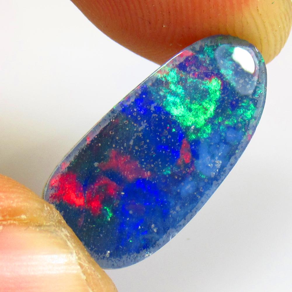 4.96 Ctw Natural Australian Doublet Opal Oval Cabochon: No Reserve! Title: 4.96 Ctw Natural Australian Doublet Opal Oval Cabochon Stone Clarity: Opaque Gemstones: Natural Australian Opal Size/Dimensions: 4.96 Carat Weights: 19.50 x 9.40 x 3.60 mm Additiona