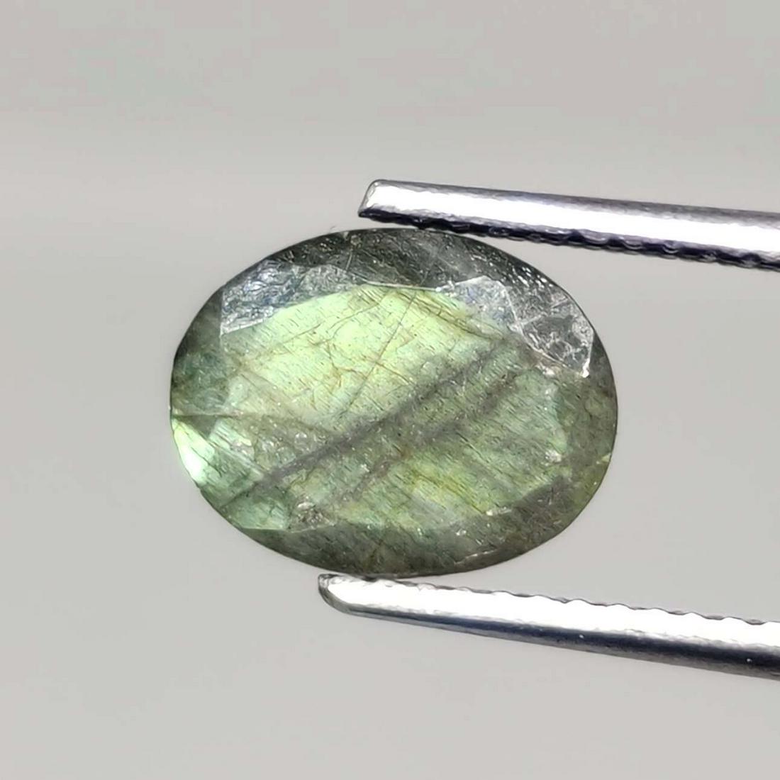 1.75 ct Natural Faceted Labradorite: No Reserve! Title: 1.75 ct Natural Faceted Labradorite Additional Information: Gemstones: Labradorite Carat Weights: 1.75 ct Size/Dimensions: 7 X 9 mm Origin : Labrador Materials & Techniques: Labrado