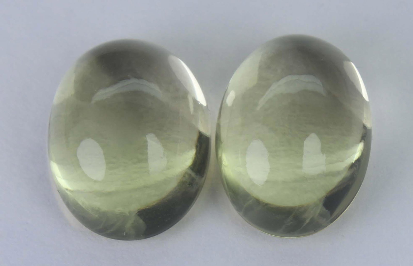 12.74 Cst Natural Lemon Lot: No Reserve! Title: 12.74 Cst Natural Lemon Lot Additional Information: Gemstone : Natural Lemon Shape and cut : Oval Cabochan Weight : 12.74 carats Measurements : 13.70x9.81x6.34 mm -13.62x10.38x6.61 