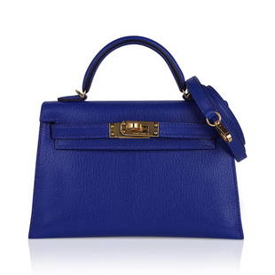 Hermes Kelly 20 Mini Sellier Bag Blue de Royal Chevre Leather Gold Hardware: Guaranteed authentic Hermes Kelly 20 Mini Sellier bag featured in vibrant richly saturated Bleu de Royal. Hermes Blue de Royal is a vibrant jewel toned blue which is gorgeous for year round wear,