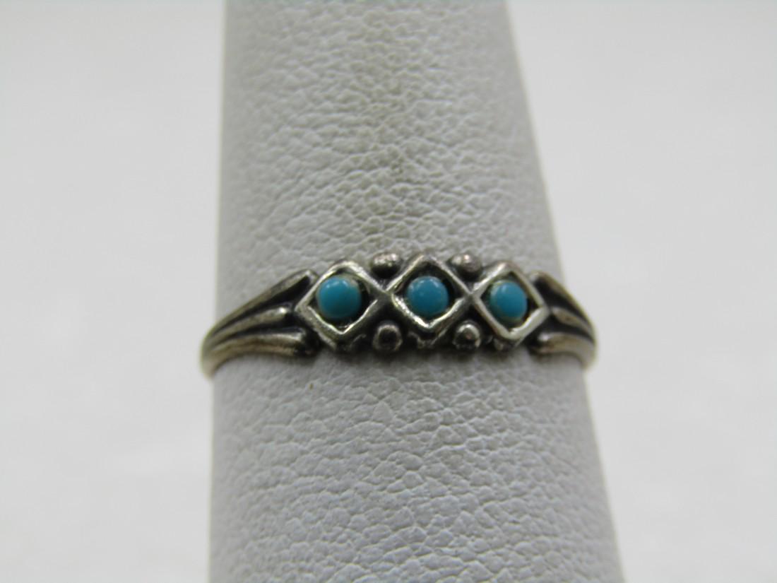 Vintage Turquoise Snake Eye Ring, Signed Uncas, Size 6, Southwestern, 1960's-1970's: Vintage Turquoise Snake Eye Ring, Signed Uncas, Size 6, Southwestern, 1960's-1970's. The ring is marked sterling and tested. Weight is appx. 1.70 gr. It has three turquiose snake eye 1mm stones set in