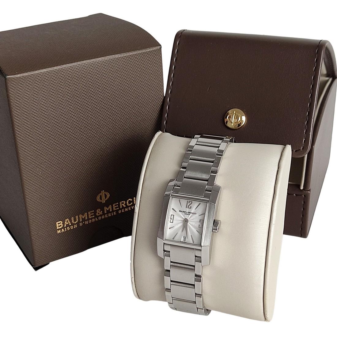BAUME & MERCIER Steel lady's watch "65488 Diamant Hampton": Title: BAUME & MERCIER Steel lady's watch "65488 Diamant Hampton" Material: Steel Size/Dimensions: Dial width 2.3 cm - Circumference 18 cm Description: (4650). Diamant Hampton 65488 steel woman watch 