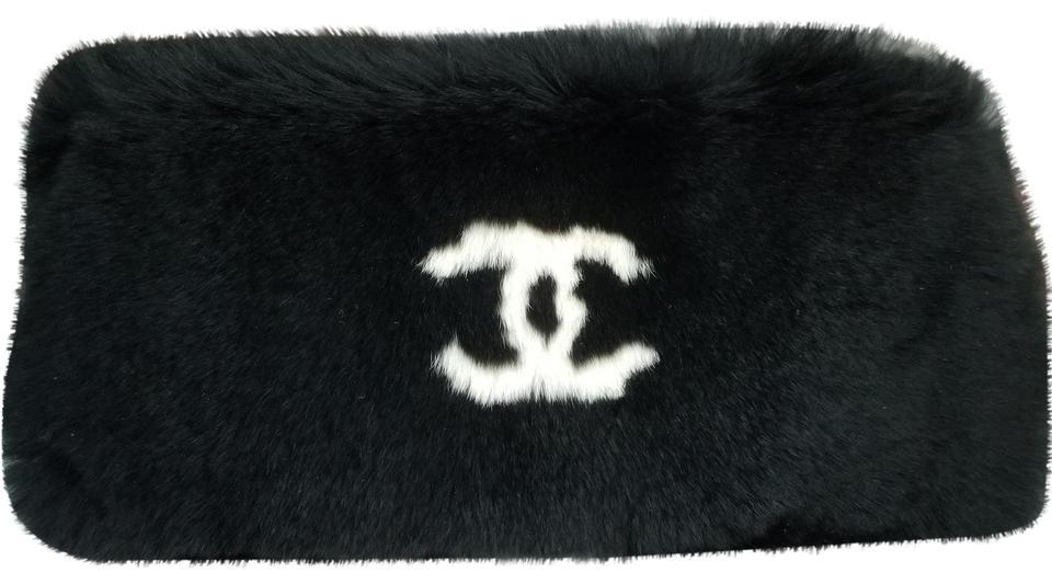 Chanel Black Lapin Rabbit Fur Wrist Cuff Bracelet: Chanel Black Lapin Rabbit Fur Wrist Cuff Bracelet. We offer this unique fur bracelet cuff with super soft lapin rabbit in a deep black color with white CC Logo for CoCo. This wrist fur is quite rare a