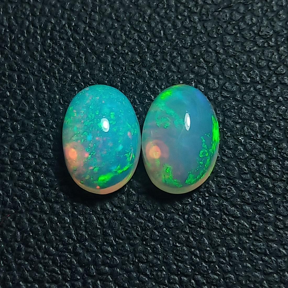 1.25 CTS 2 PCS NATURAL ETHIOPIAN MULTI COLOR OPAL OVAL SHAPE GOOD LUSTER LOOSE GEMSTONES (1 of 4)