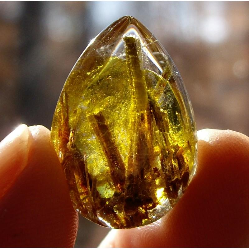 Exclusive quartz teardrop tourmaline inclusion crystal: MATERIAL: Tourmaline incl, Quartz CONDITION: Very good condition Size: 0,9 inch (23 mm) x 0,7 inch (17 mm) Tourmaline is a rare stone in mineralogy, the only natural crystal in the world, quite often 