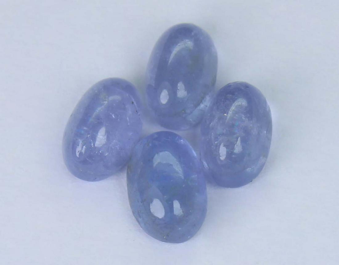 2.41 cts Natural Tanzanite Lot: No Reserve! Title: 2.41 cts Natural Tanzanite Lot Additional Information: Gemstone : Natural Tanzanite Shape and cut : Oval Cabochon Weight : 2.41 carats Measurements : 6.18x4.14x3.04 mm - 5.76x3.73x2