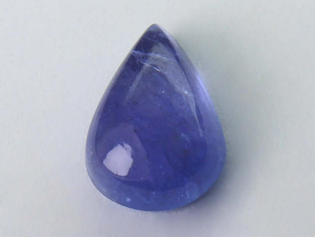 2.10 cts Natural Tanzanite: No Reserve! Title: 2.10 cts Natural Tanzanite Additional Information: Gemstone : Natural Tanzanite Shape and cut : Pear Cabochon Weight : 2.10 carats Measurements : 10x7 mm Color : Brown Transparency 