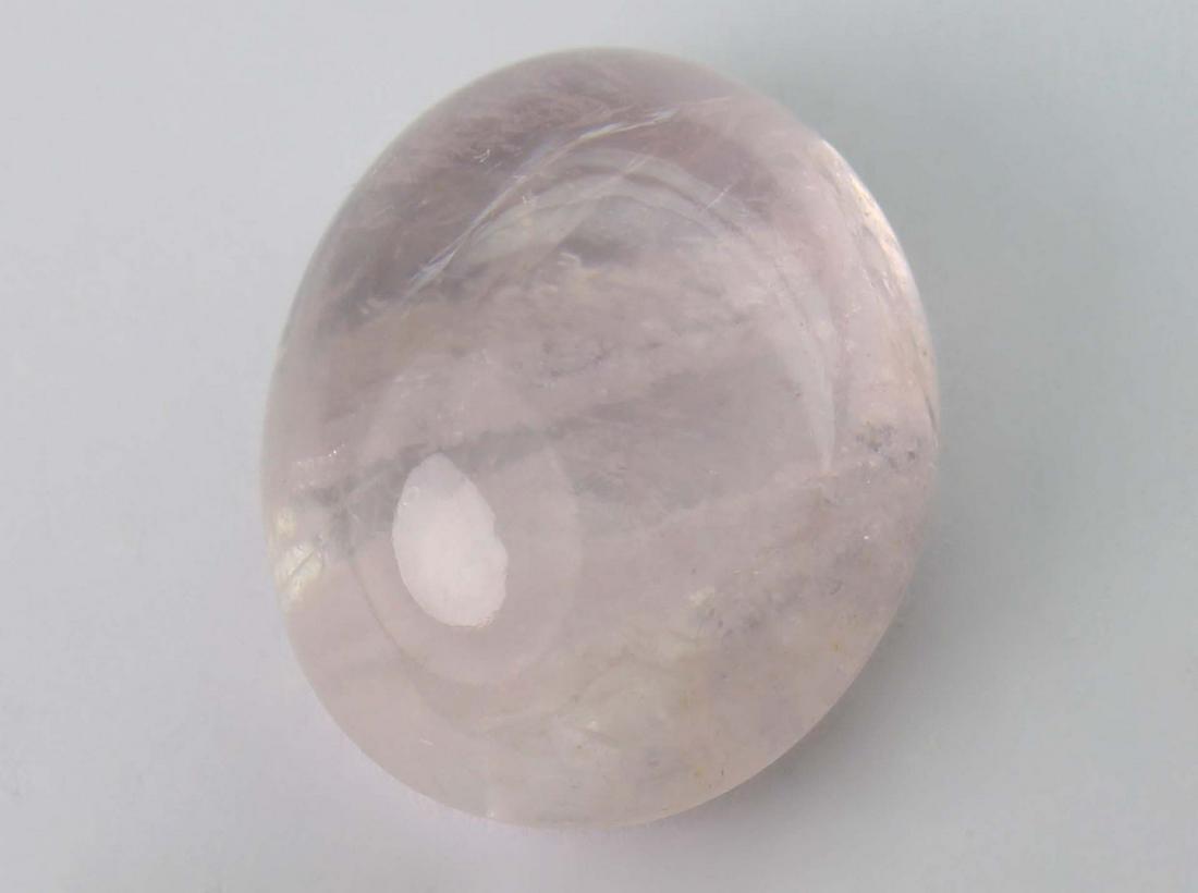 14.66 cts Natural Morganite: No Reserve! Title: 14.66 cts Natural Morganite Additional Information: Gemstone : Natural Morganite Shape and Cut : Oval Cabochon Weight : 14.66 carats Measurements : 17x14 mm Color : Peach Transparen