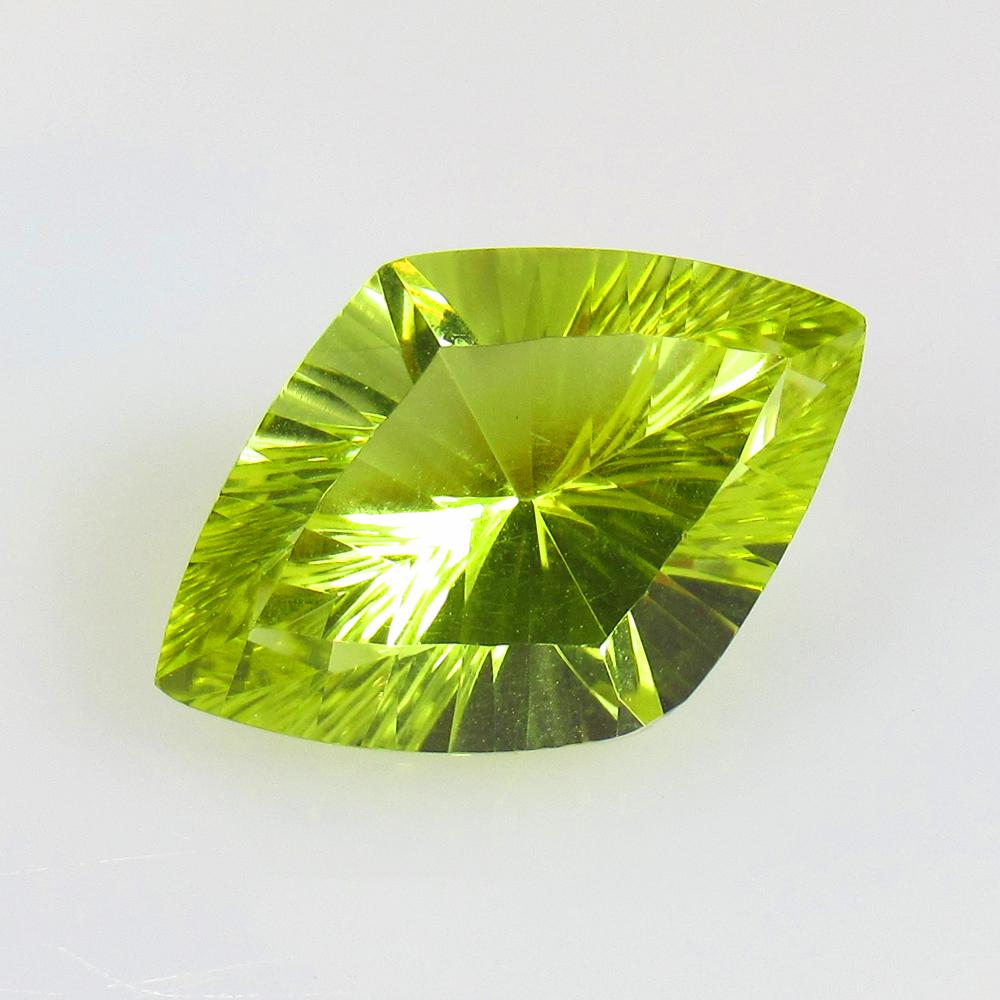 9.91 Ctw Natural Lemon Quartz Concave Cut: No Reserve! Title: 9.91 Ctw Natural Lemon Quartz Concave Cut Stone Clarity: VVS Gemstones: Natural Lemon Quartz Size/Dimensions: 9.91 Carat Weights: 19.50 x 13.10 x 9.20 mm Additional Information: Top