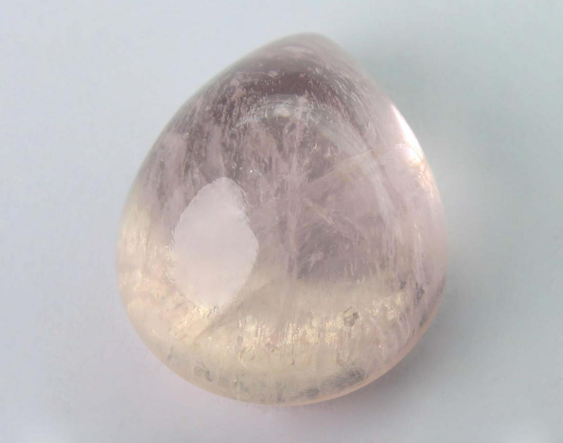 12.56 cts Natural Morganite: No Reserve! Title: 12.56 cts Natural Morganite Additional Information: Gemstone : Natural Morganite Shape and Cut : Pear Cabochon Weight : 12.56 carats Measurements : 16.80x12.30x9.00 mm Color : Peach