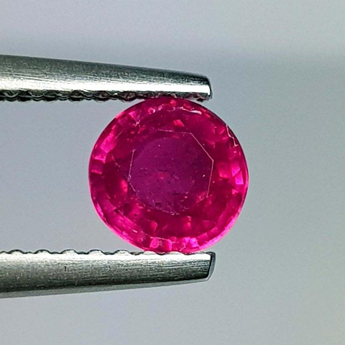0.85 ctz Natural Ruby: No Reserve! Title: 0.85 ctz Natural Ruby Color/Clarity: Pinkis Red / VVS Gemstones: Ruby Carat Weights: 0.85 Size/Dimensions: 5.20 x 5.20 x 3.30 Additional Information: Round / Burma Shipping: Domes