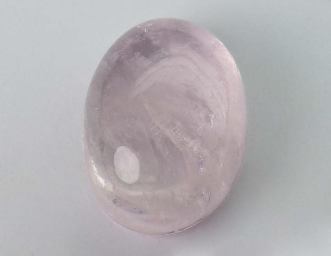 6.45 cts Natural Morganite: No Reserve! Title: 6.45 cts Natural Morganite Additional Information: Gemstone : Natural Morganite Shape and Cut : Oval Cabochon Weight : 6.45 carats Measurements : 14x10 mm Color : Peach Transparency