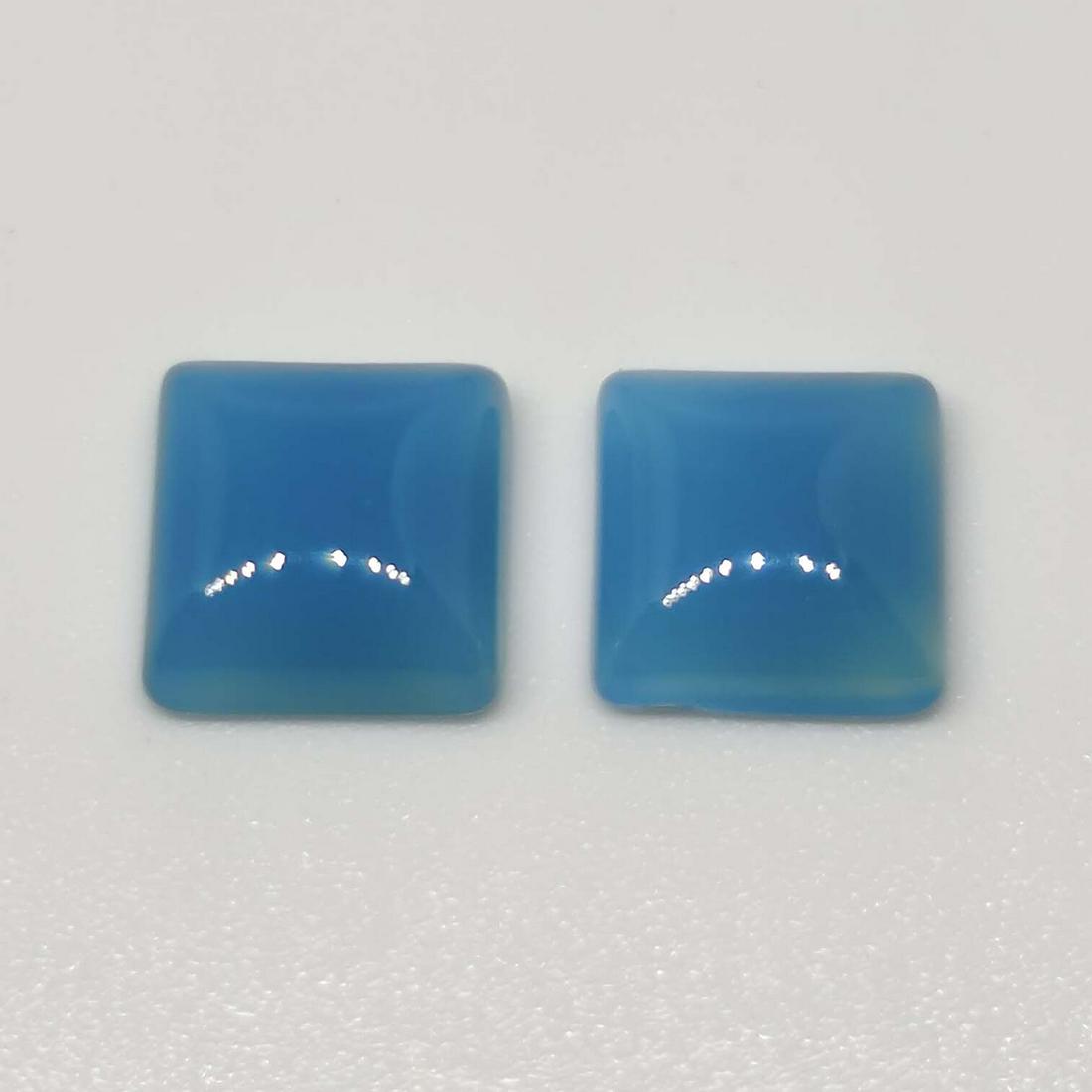 8.30 ct Natural Blue Chalcedony Pair: No Reserve! Gemstones: Chalcedony Carat Weights: 8.30 ct Size/Dimensions: 10 X 10 mm Shipping: Domestic: Flat-rate of $7.00 to anywhere within the contiguous U.S. International: Foreign shipping rates