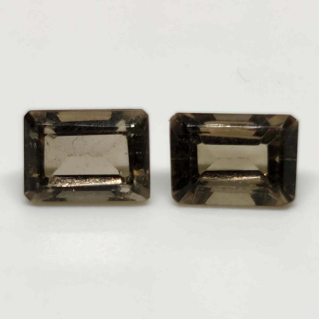 2.15 ct Natural Facetd Smoky Quartz Pair: No Reserve! Gemstones: Smoky Quartz Carat Weights: 2.15 ct Size/Dimensions: 7 X 5 Origin : Scotland Shipping: Domestic: Flat-rate of $7.00 to anywhere within the contiguous U.S. International: Foreign