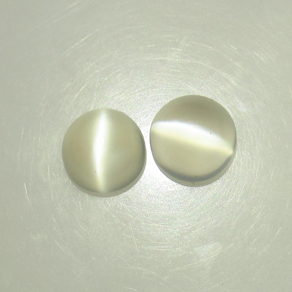 6.23 Ctw Natural Moonstone Round Pair: No Reserve! Title: 6.23 Ctw Natural Moonstone Round Pair Stone Clarity: Semi-Transparent Gemstones: Moonstone Size/Dimensions: 6.23 Carat Weights: 9.10 x 9.10 x 5.60 mm / 2 Pc's Additional Information