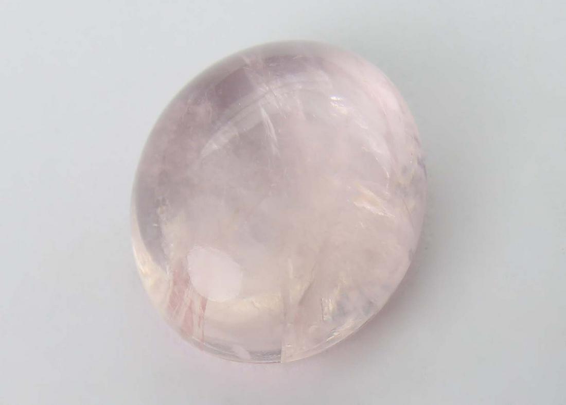 5.41 cts Natural Morganite: No Reserve! Title: 5.41 cts Natural Morganite Additional Information: Gemstone : Natural Morganite Shape and Cut : Oval Cabochon Weight : 5.41 carats Measurements : 12.60x10.46x5.51 mm Color : Peach T