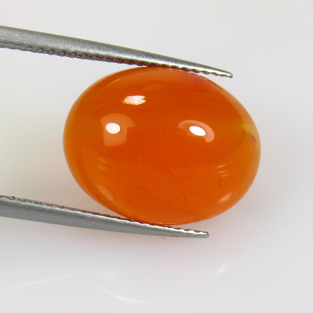 9.37 Ctw Natural Orange Carnelian Oval Cab: No Reserve! Title: 9.37 Ctw Natural Orange Carnelian Oval Cab Stone Clarity: Semi-Transparent Gemstones: Carnelian Size/Dimensions: 9.37 Carat Weights: 16.20 x 12.80 x 6.40 mm Additional Information: 
