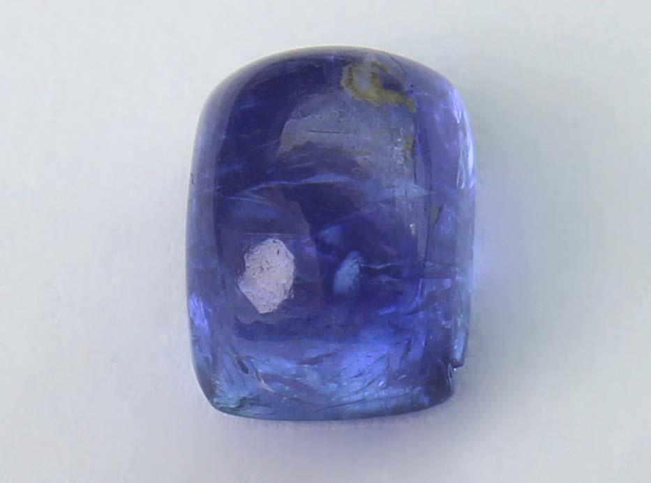 1.72 cts Natural Tanzanite: No Reserve! Title: 1.72 cts Natural Tanzanite Additional Information: Gemstone : Natural Tanzanite Shape and cut : Rectangular Cabochon Weight : 1.72 carats Measurements : 7x5 mm Color : Brown Transpa