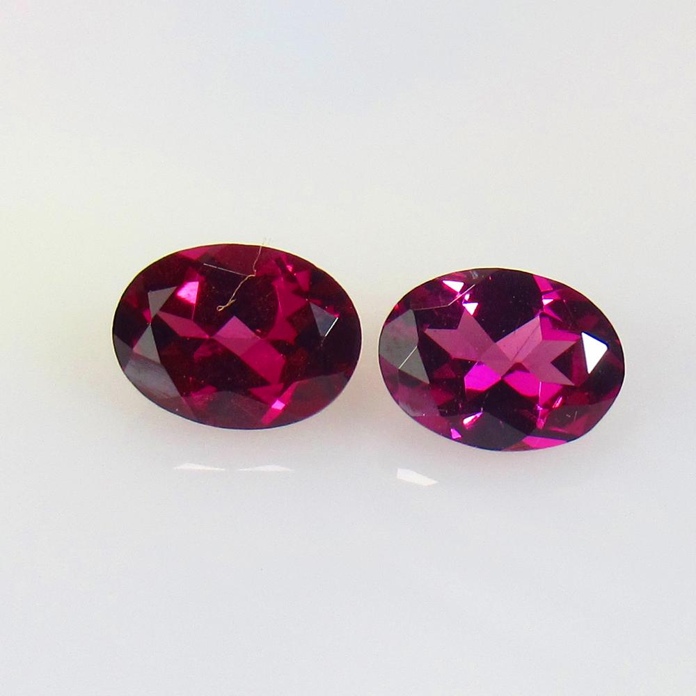 3.30 Ctw Natural Pink Rhodolite Garnet Oval Pair: No Reserve! Title: 3.30 Ctw Natural Pink Rhodolite Garnet Oval Pair Stone Clarity: VVS Gemstones: Natural Rhodolite Garnet Size/Dimensions: 3.3 Carat Weights: 8.20 x 6.10 x 3.80 mm / 2 Pc's Additional