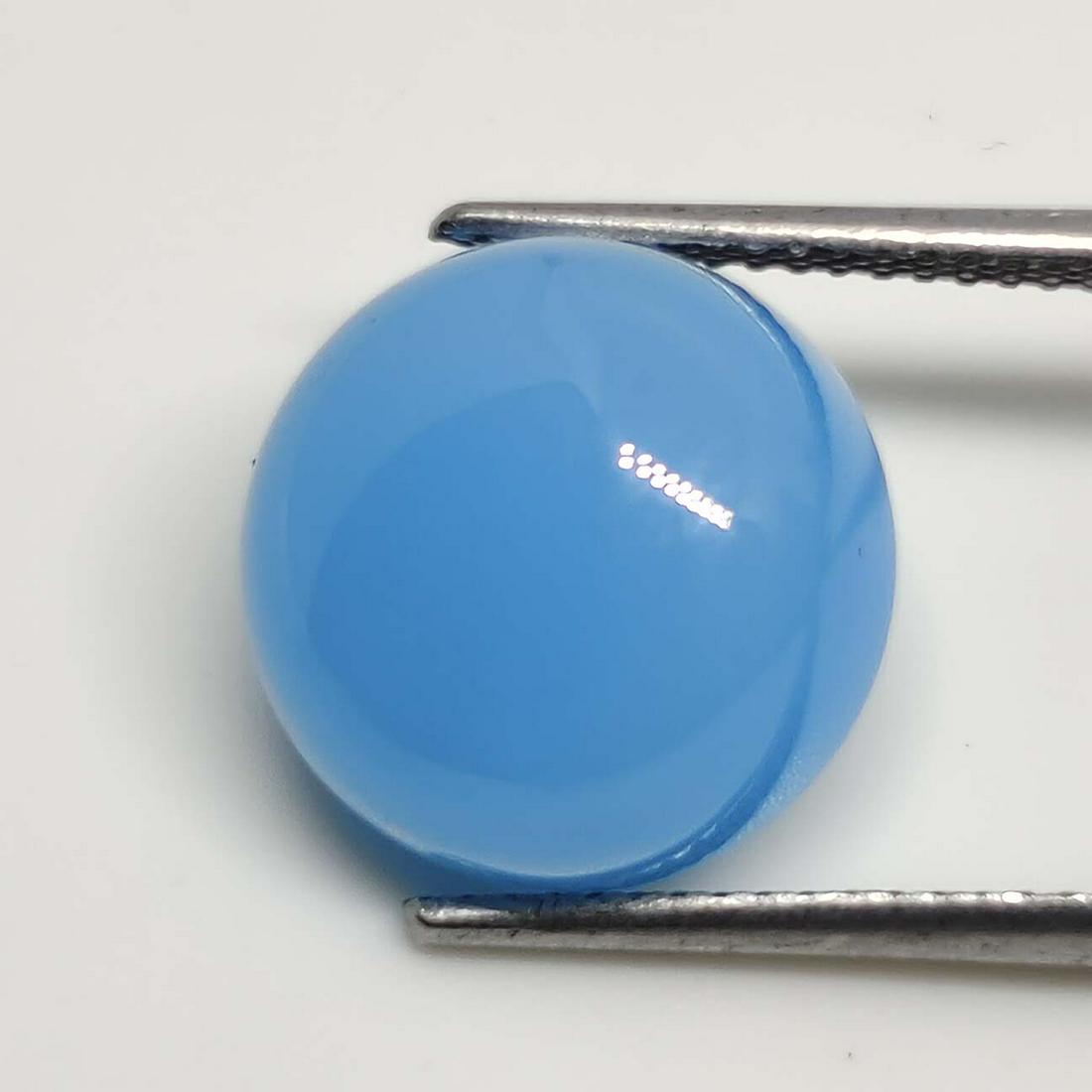 8.10 ct Natural Blue Chalcedony Round cab: No Reserve! Gemstones: Chalcedony Carat Weights: 8.10 ct Size/Dimensions: 11 X 11 mm Shipping: Domestic: Flat-rate of $7.00 to anywhere within the contiguous U.S. International: Foreign shipping rates