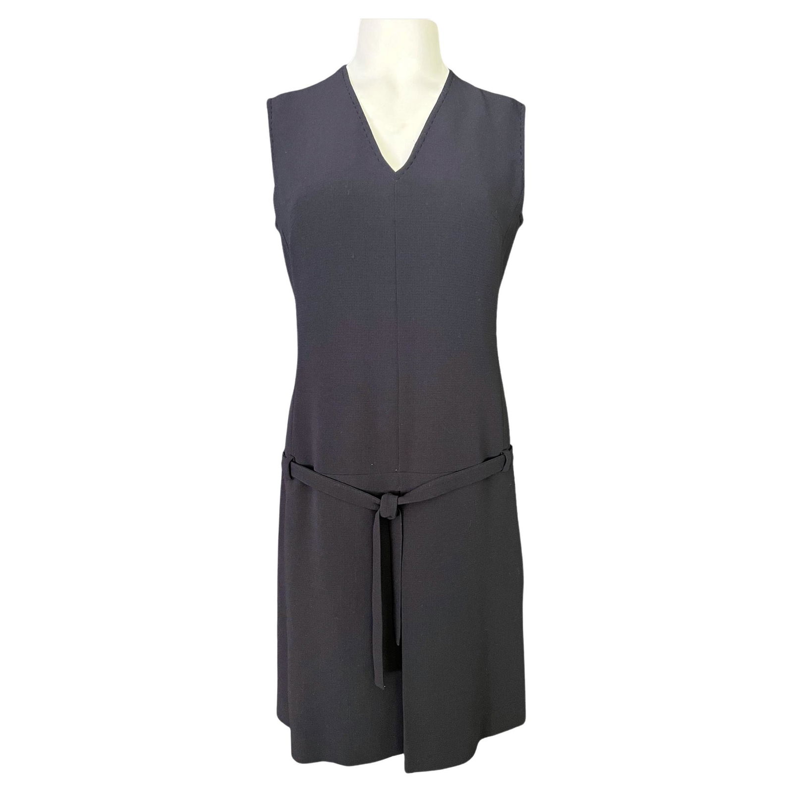 Max Mara Navy Wool Mini Dress, Size 6: V neckline - Sleeveless style - Mini length - Detailed with belt - Concealed rear zip closure - Rear lit detail - Made in Italy Details Dimensions Length: 37 in. (93.98 cm)Marked Size: 6 (US)Bust: 36