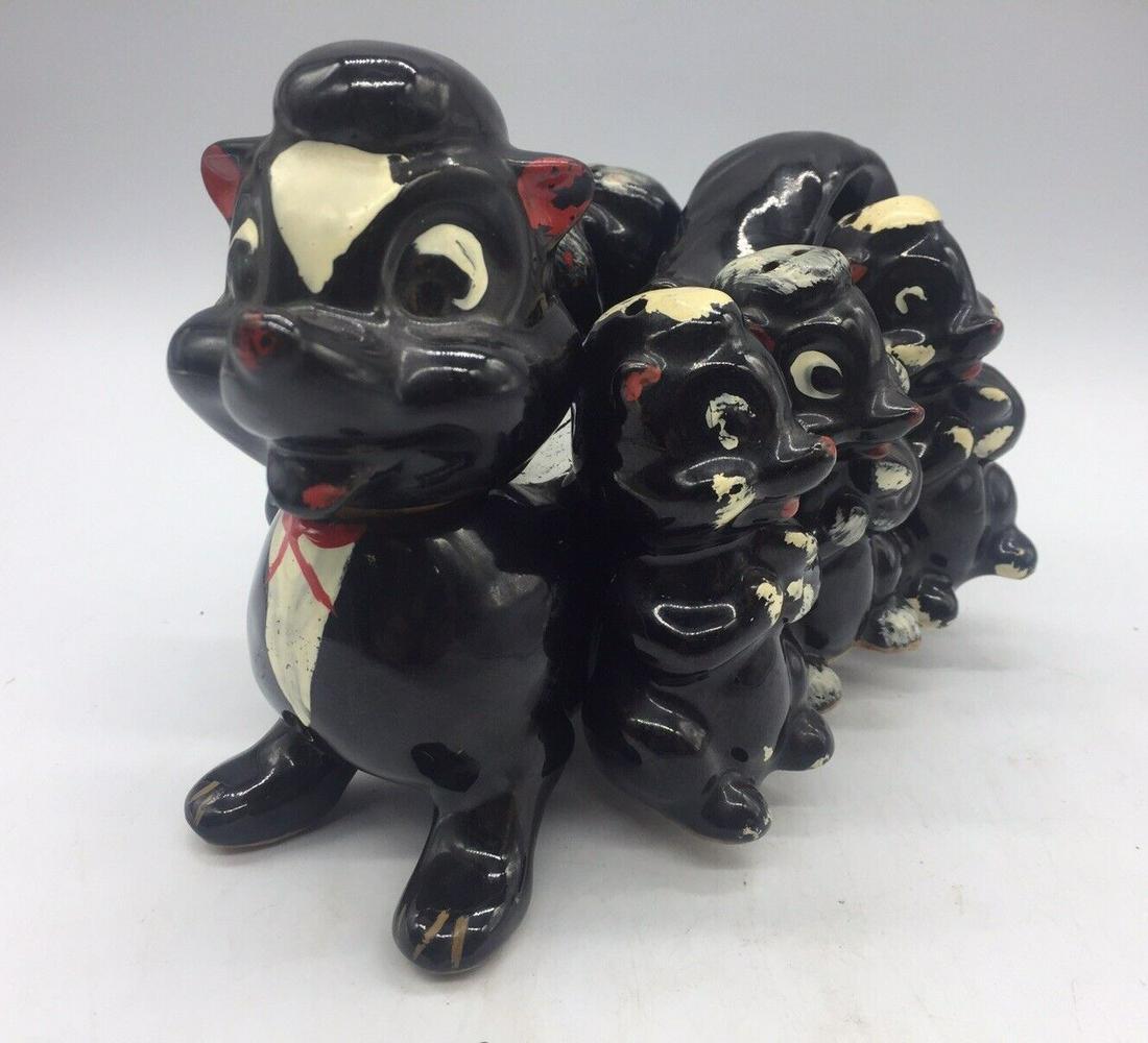 Redware Skunk Mom Carrying Babies Salt Pepper Spice Shaker Set: Title: Redware SKUNK MOM CARRYING BABIES SALT PEPPER SPICE SHAKER SET Date/Period: Dimension: mom is approx 8 x 5" Materials: redware Additional Information: VINTAGE SKUNK MOM CARRYING BABIES SALT PEP