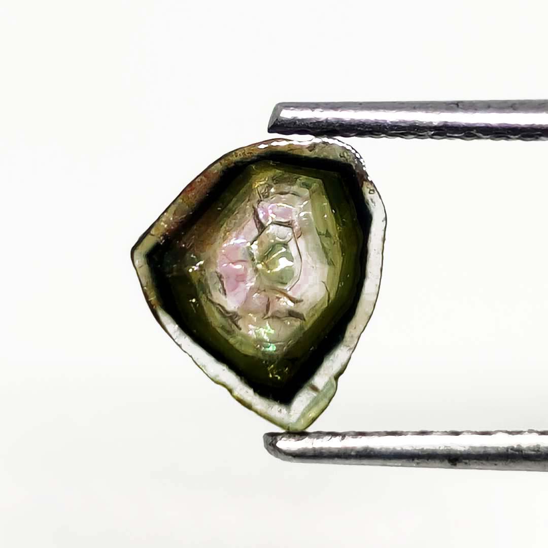 1.65 ct Natural Watermelon Bio Tourmaline Slice: No Reserve! Gemstones: Tourmaline Carat Weights: 1.65 ct Size/Dimensions: 7 X 7 mm Shipping: Domestic: Flat-rate of $7.00 to anywhere within the contiguous U.S. International: Foreign shipping rates a