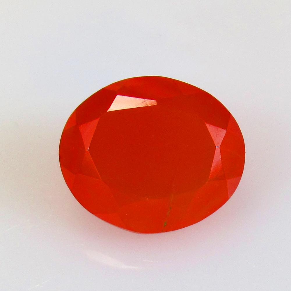 7.05 Ctw Natural Orange Carnelian Oval Cut: No Reserve! Title: 7.05 Ctw Natural Orange Carnelian Oval Cut Stone Clarity: Semi-Transparent Gemstones: Carnelian Size/Dimensions: 7.05 Carat Weights: 13.80 x 11.80 x 7.70 mm Additional Information: 