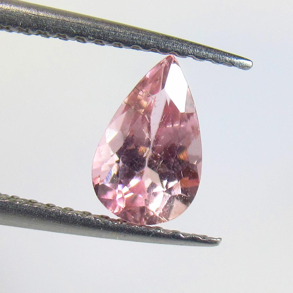 1.01 Ctw Natural Pink Tourmaline Pear Cut: No Reserve! Title: 1.01 Ctw Natural Pink Tourmaline Pear Cut Stone Clarity: VVS Gemstones: Tourmaline Size/Dimensions: 1.01 Carat Weights: 8.00 x 5.10 x 4.20 mm Additional Information: Pear Cut / Orig