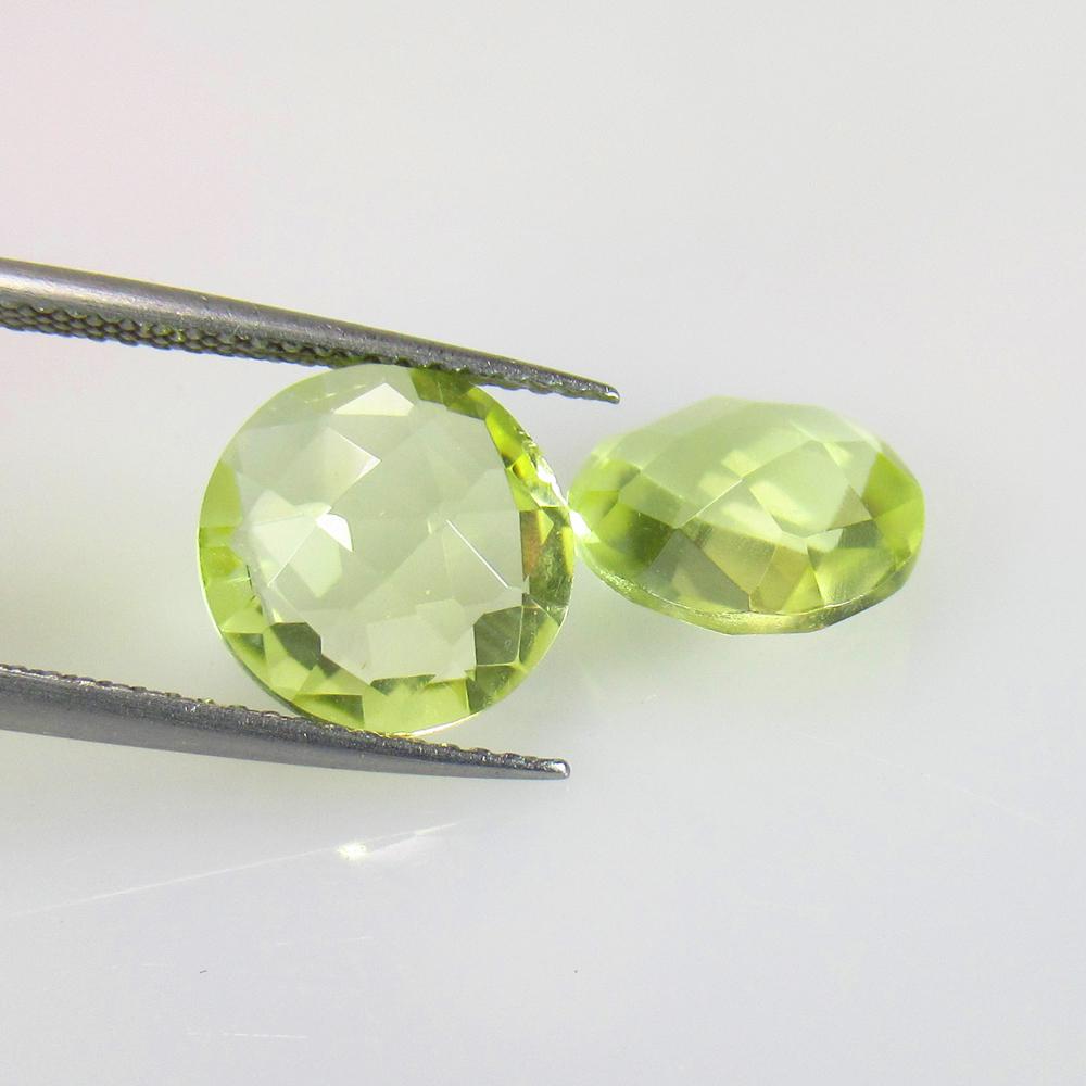 5.71 Ctw Natural Lemon Quartz Round Checkerboard Pair: No Reserve! Title: 5.71 Ctw Natural Lemon Quartz Round Checkerboard Pair Stone Clarity: VVS Gemstones: Natural Lemon Quartz Size/Dimensions: 5.71 Carat Weights: 9.90 x 9.90 x 5.40 mm / 2 Pc's Addition