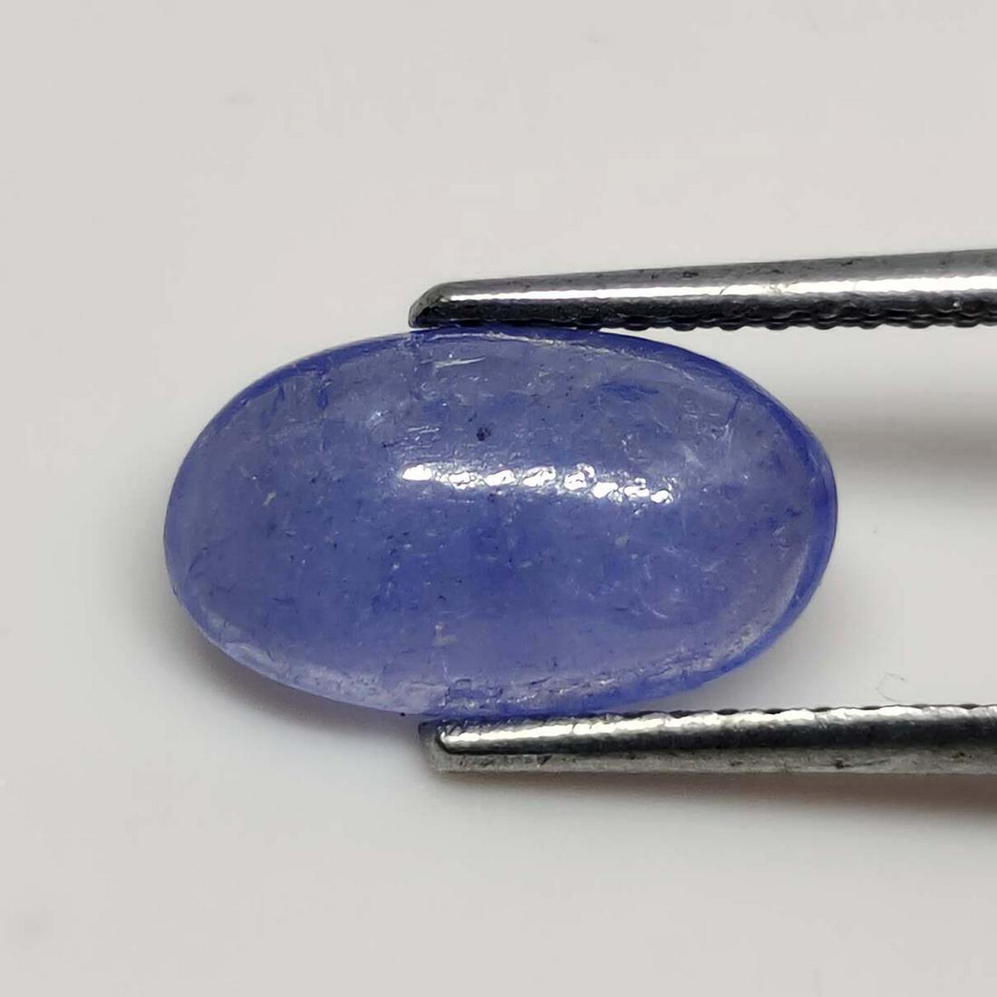 2.15 ct Natural Tanzanite Cab: No Reserve! Gemstones: Tanzanite Carat Weights: 2.15 ct Size/Dimensions: 11 X 6.5 X 3 mm Shipping: Domestic: Flat-rate of $7.00 to anywhere within the contiguous U.S. International: Foreign shipping r