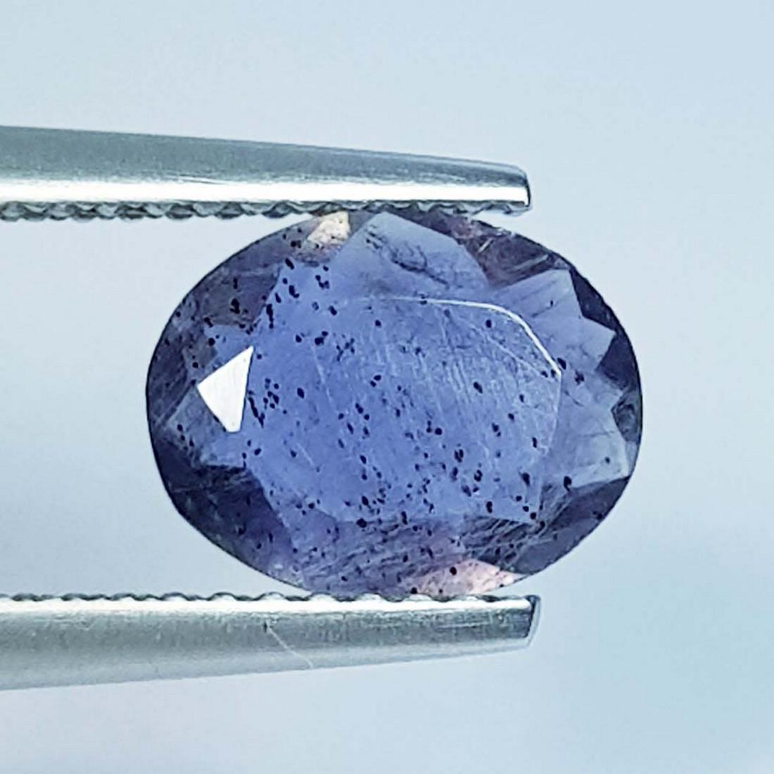 0.96 Ct Natural Iolite Oval Cut: No Reserve! Title: 0.96 Ct Natural Iolite Oval Cut Color/Clarity: Blue / SI Gemstones: Lolite Carat Weights: 0.96 Size/Dimensions: 8.80 x 7.00 x 2.80 Additional Information: Oval - Africa Shipping: D