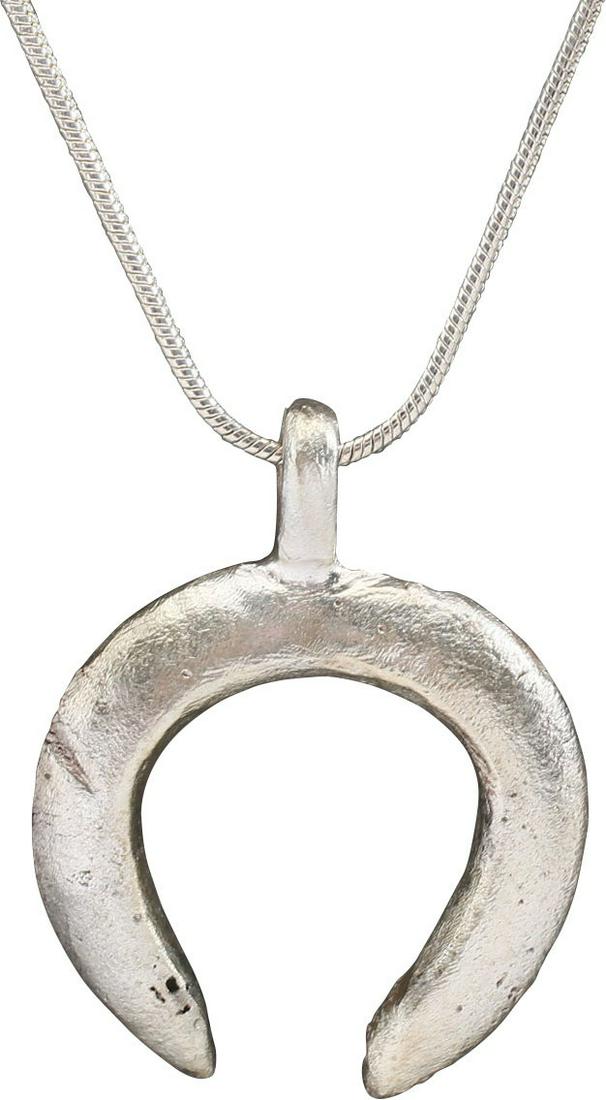 VIKING LUNAR PENDANT NECKLACE C.900 - 1000 AD: Just over 1" width. As expert navigators, the constellations signified mystery and power to Vikings. The Moon was personified as Mani, brother to Sol the Sun, and is abundantly represented in Norse li