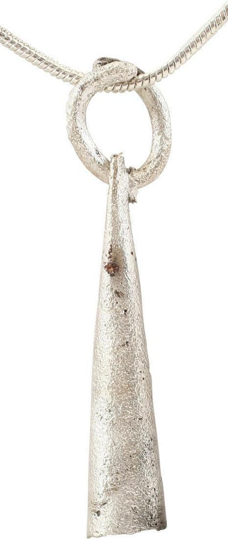 VIKING TUBULAR BEAD/PENDANT, 866-1067 AD: Danelaw England. Silvered bronze, over 1 1/8" of elongated conical form with butted seam and pierced terminal with its original suspension ring. These were incorporated into larger complex necklaces s